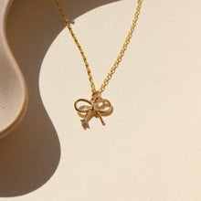 Load image into Gallery viewer, TKN Petite Bow Charm Necklace
